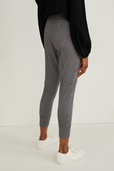 Femei - Pantaloni de trening - în carouri - negru / alb