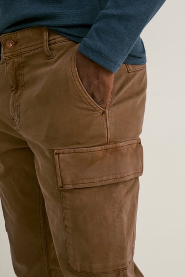 Mężczyźni - Spodnie bojówki - tapered fit - kaki