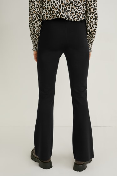 Dames - Jersey broek - flared - zwart