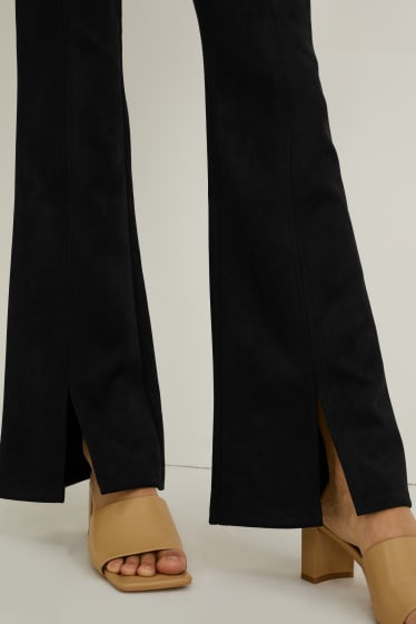 Kobiety - Spodnie - wysoki stan - flared - imitacja zamszu - czarny