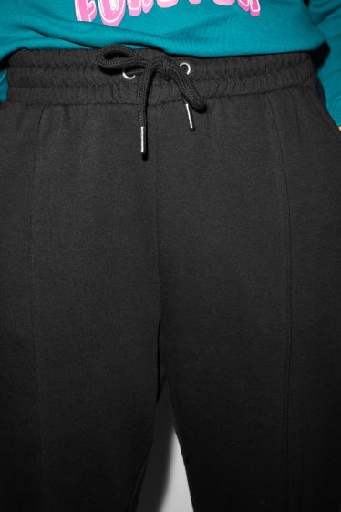 Joves - CLOCKHOUSE - pantalons de xandall - negre