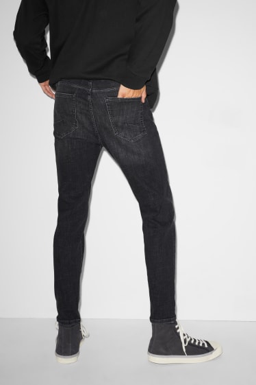 Hombre - CLOCKHOUSE - carrot jeans - LYCRA® - reciclados - vaqueros - gris oscuro