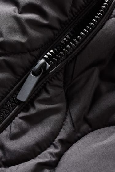 Dona - Abric embuatat - negre