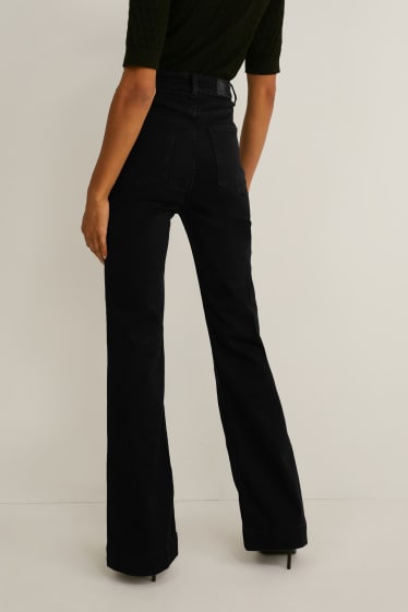 Dámské - Flare jeans - high waist - tvarující džíny - LYCRA® - černá