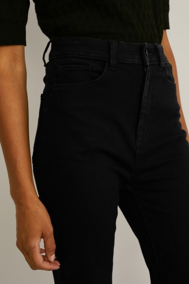 Femmes - Jean á jambe évasée - high waist - jean galbant - LYCRA® - noir