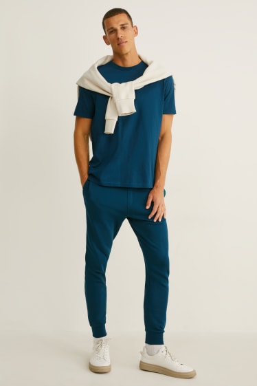 Hommes - Pantalon de jogging - turquoise foncé