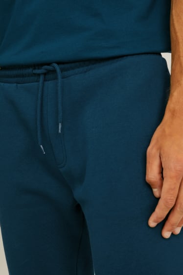 Hommes - Pantalon de jogging - turquoise foncé