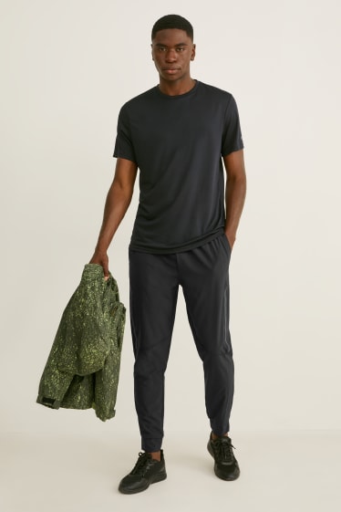 Hombre - Pantalón de deporte funcional - Flex - 4 Way Stretch  - negro