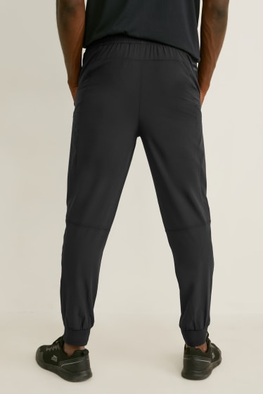 Pánské - Funkční teplákové kalhoty - Flex - 4 Way Stretch  - černá