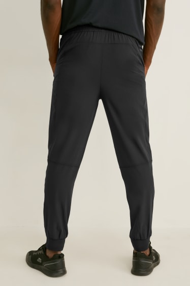 Uomo - Pantaloni sportivi tecnici - Flex - 4 Way Stretch  - nero