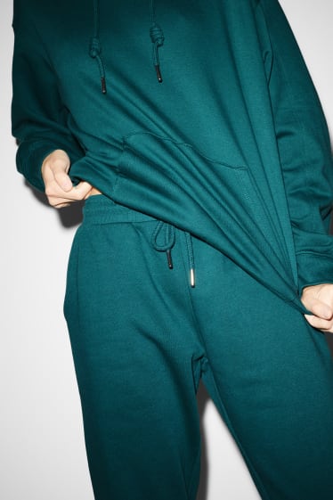 Femmes - CLOCKHOUSE - pantalon de jogging  - vert foncé