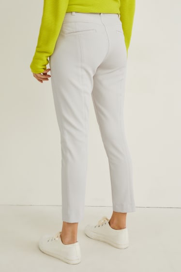 Dona - Pantalons de tela - mid waist - slim fit - blanc trencat