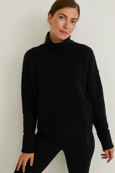 Damen - Bouclé-Rollkragenpullover - schwarz