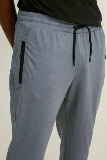 Pánské - Teplákové kalhoty  - šedá-žíhaná