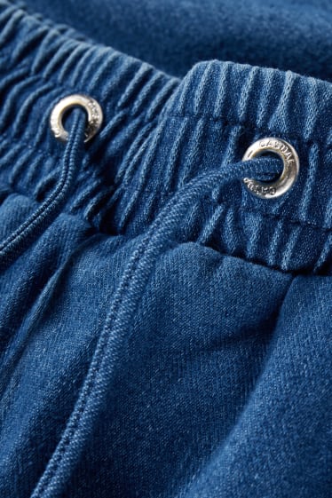 Femmes - Jean - mid waist - tapered fit - jean bleu