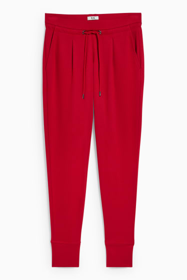 Dámské - Žerzejové kalhoty - tapered fit - červená