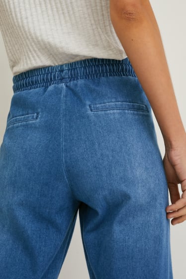 Dames - Spijkerbroek - mid waist - tapered fit - jeansblauw