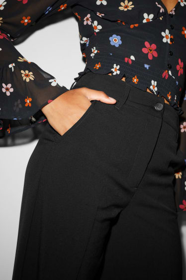Dona - CLOCKHOUSE - pantalons de tela - high waist - wide leg - negre