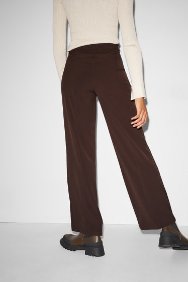 Kobiety - CLOCKHOUSE - spodnie materiałowe - wysoki stan - szerokie nogawki - ciemnobrązowy