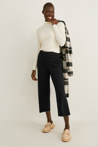 Kobiety - Spodnie materiałowe - wysoki stan - szerokie nogawki - czarny