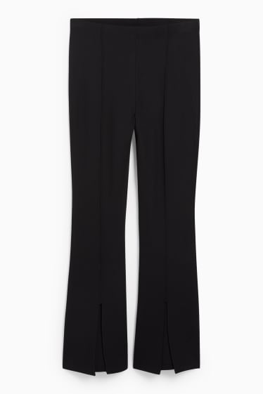 Ados & jeunes adultes - CLOCKHOUSE - pantalon en jersey - flared - noir