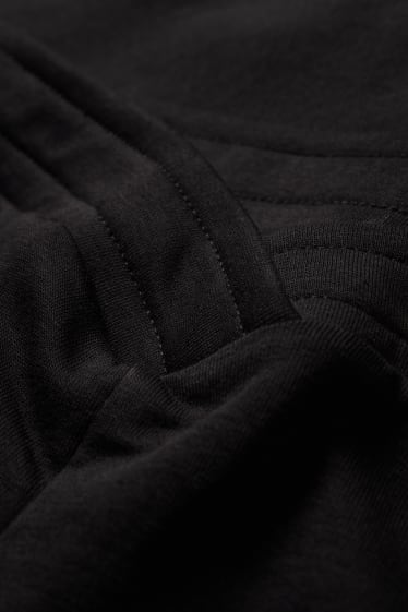 Dames - CLOCKHOUSE - broek van sweatstof - wide leg - zwart