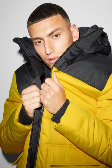 Men - CLOCKHOUSE - quilted jacket with hood - yellow