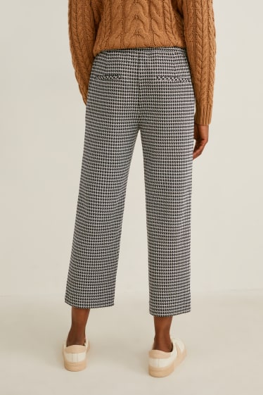 Donna - Pantaloni di jersey - gamba ampia - a quadretti - nero / bianco