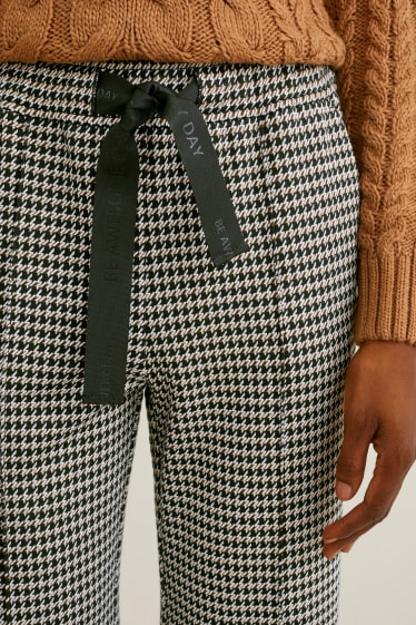 Donna - Pantaloni di jersey - gamba ampia - a quadretti - nero / bianco