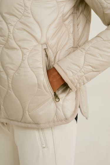 Women - Quilted gilet - pearl