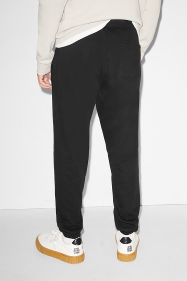 Hommes - CLOCKHOUSE - pantalon de jogging - noir