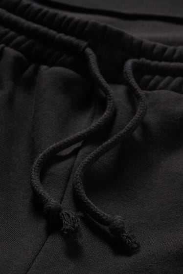 Dames - CLOCKHOUSE - broek van sweatstof - Palazzo - zwart
