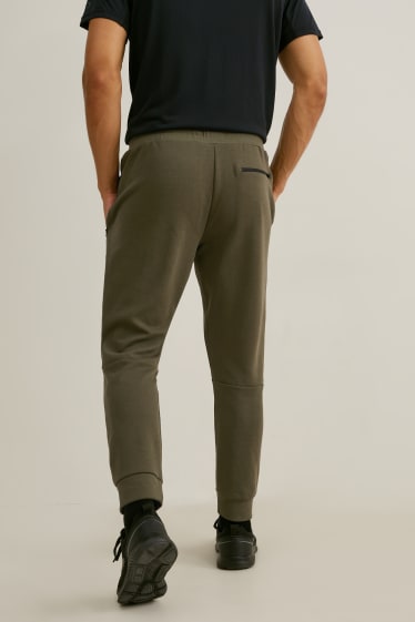 Pánské - Teplákové kalhoty  - zelená