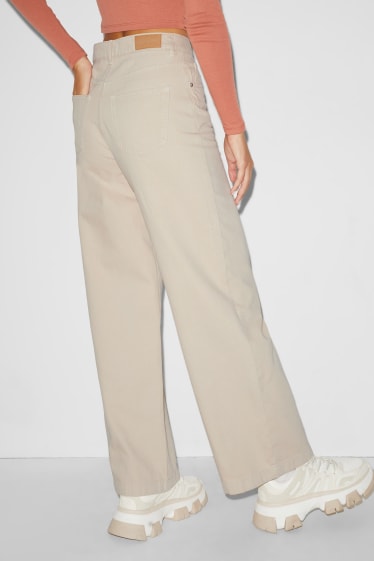 Donna - CLOCKHOUSE - jeans a gamba larga - vita alta - beige