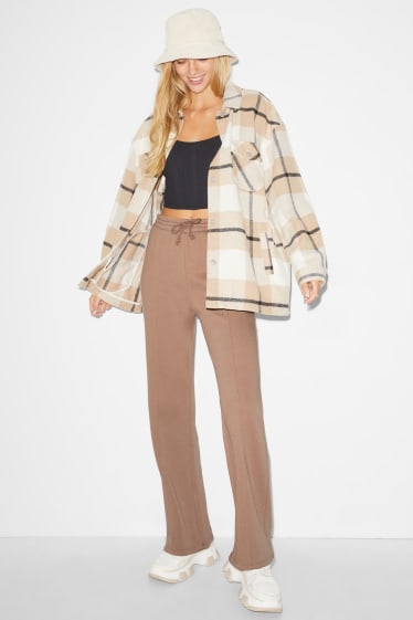 Donna - CLOCKHOUSE - pantaloni di felpa - palazzo - marrone chiaro