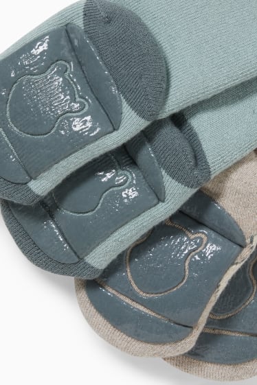 Bébés - Lot de 2 paires - Winnie l’ourson - chaussettes antidérapantes pour nouveau-né - vert / beige