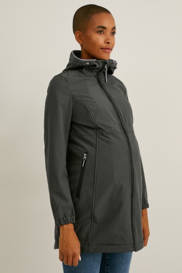 Damen - Softshell-Umstandsjacke mit Kapuze und Baby-Einsatz - dunkelgrün