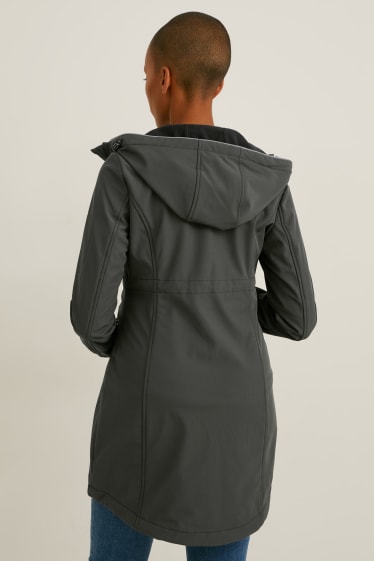 Damen - Softshell-Umstandsjacke mit Kapuze und Baby-Einsatz - dunkelgrün