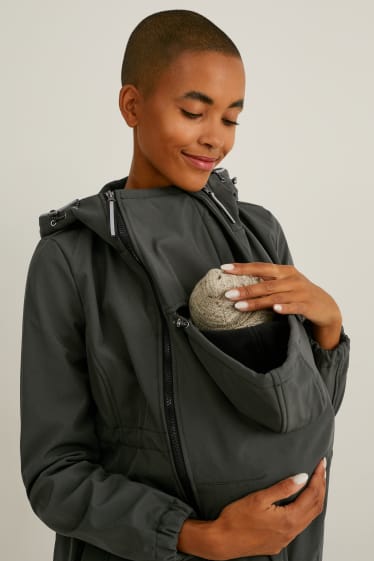 Damen - Softshell-Umstandsjacke mit Kapuze und Baby-Einsatz - dunkelgrün