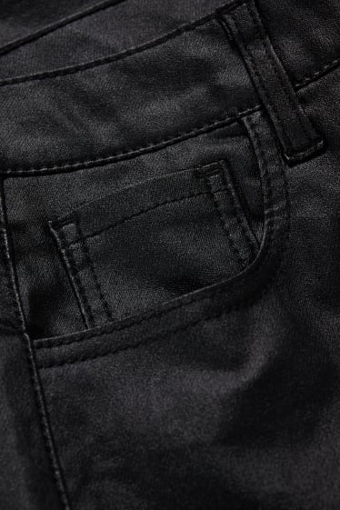 Nastolatki - CLOCKHOUSE - spodnie - wysoki stan - rozszerzane nogawki - czarny