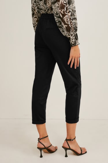 Women - Cloth trousers - high waist - regular fit - black