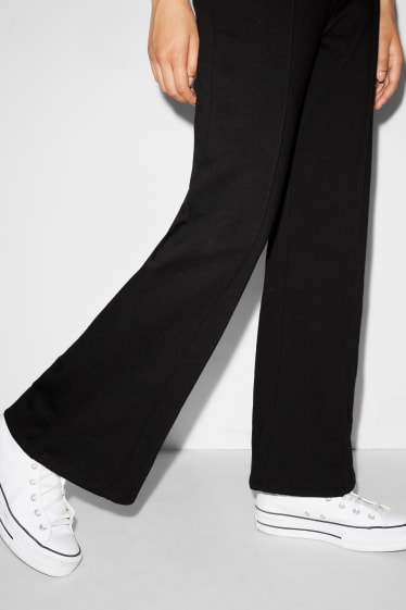Femmes - CLOCKHOUSE- pantalon en molleton - palazzo - noir