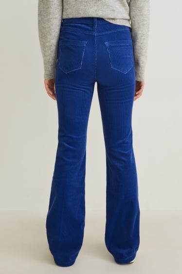 Femei - Pantaloni din catifea reiată - talie înaltă - wide flare - albastru