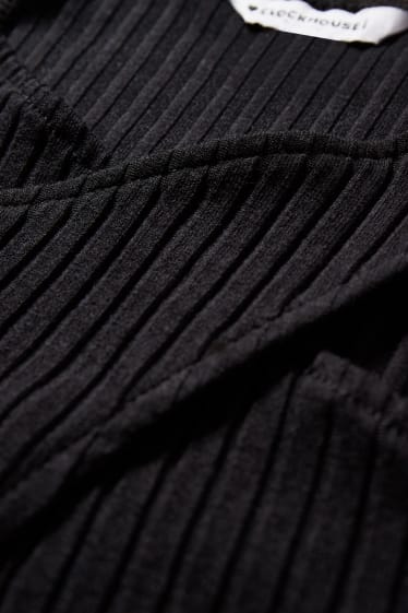 Joves - CLOCKHOUSE - samarreta crop de màniga llarga - negre