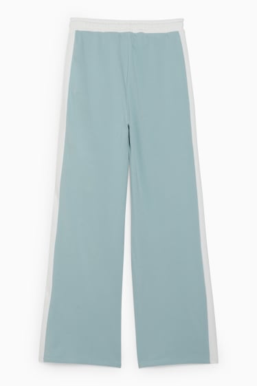 Ragazzi e giovani - CLOCKHOUSE - pantaloni sportivi - verde menta