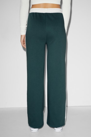 Donna - CLOCKHOUSE - pantaloni sportivi - verde scuro-melange