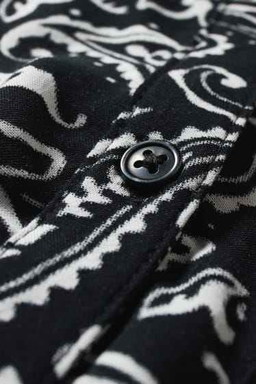 Dona - Brusa - estampada - negre/blanc