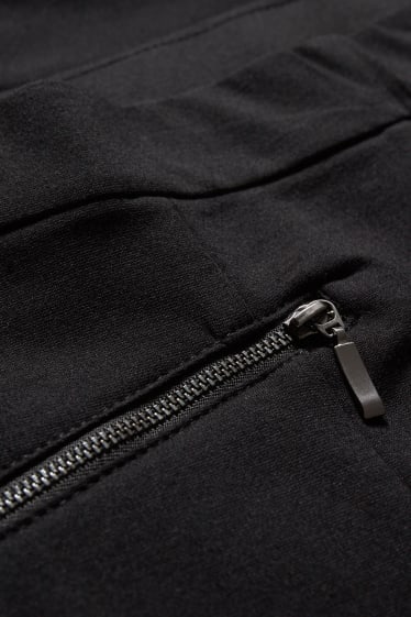 Dámské - Žerzejové kalhoty - slim fit - černá