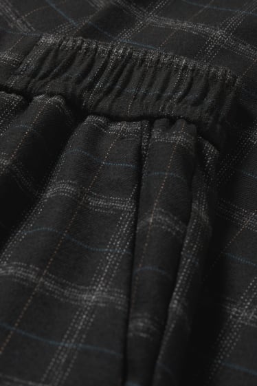Femei - Pantaloni de stofă - talie medie - tapered fit - în carouri - negru
