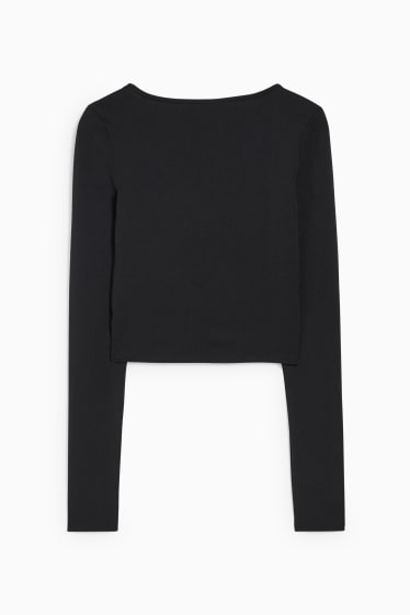 Joves - CLOCKHOUSE - samarreta de màniga llarga crop - negre